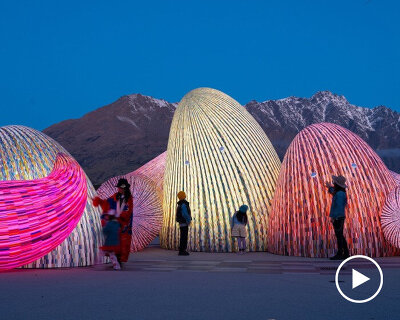 ENESS' glowing, interactive AI oracles question digital futures near new zealand mountains