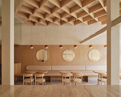 gridded ceiling tops zooco estudio's oak and travertine regma ice cream parlor