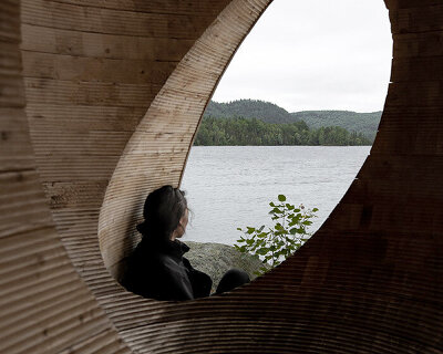 faire le vide: carved-out cedar cube installation dots remote island in quebec