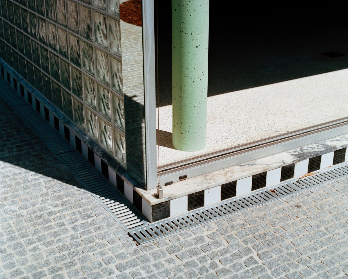fala atelier inverts the sloped roof with slants and curves for this sculptural home in portugal