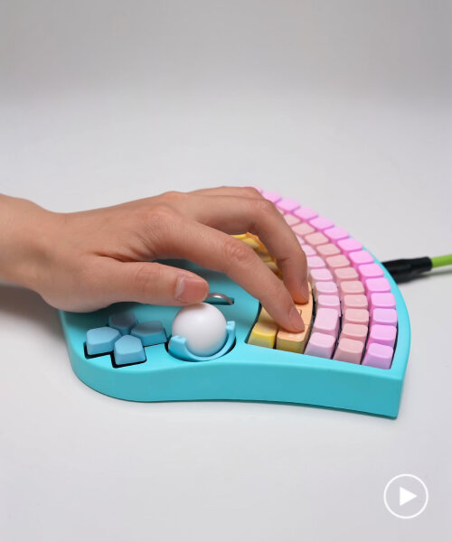 fan-shaped keyboard with built-in mouse lets users type with one hand