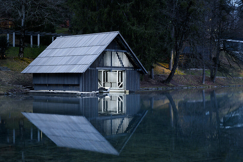 OFIS architects renovates boathouse in slovenia with rooftop garden that filters lake water