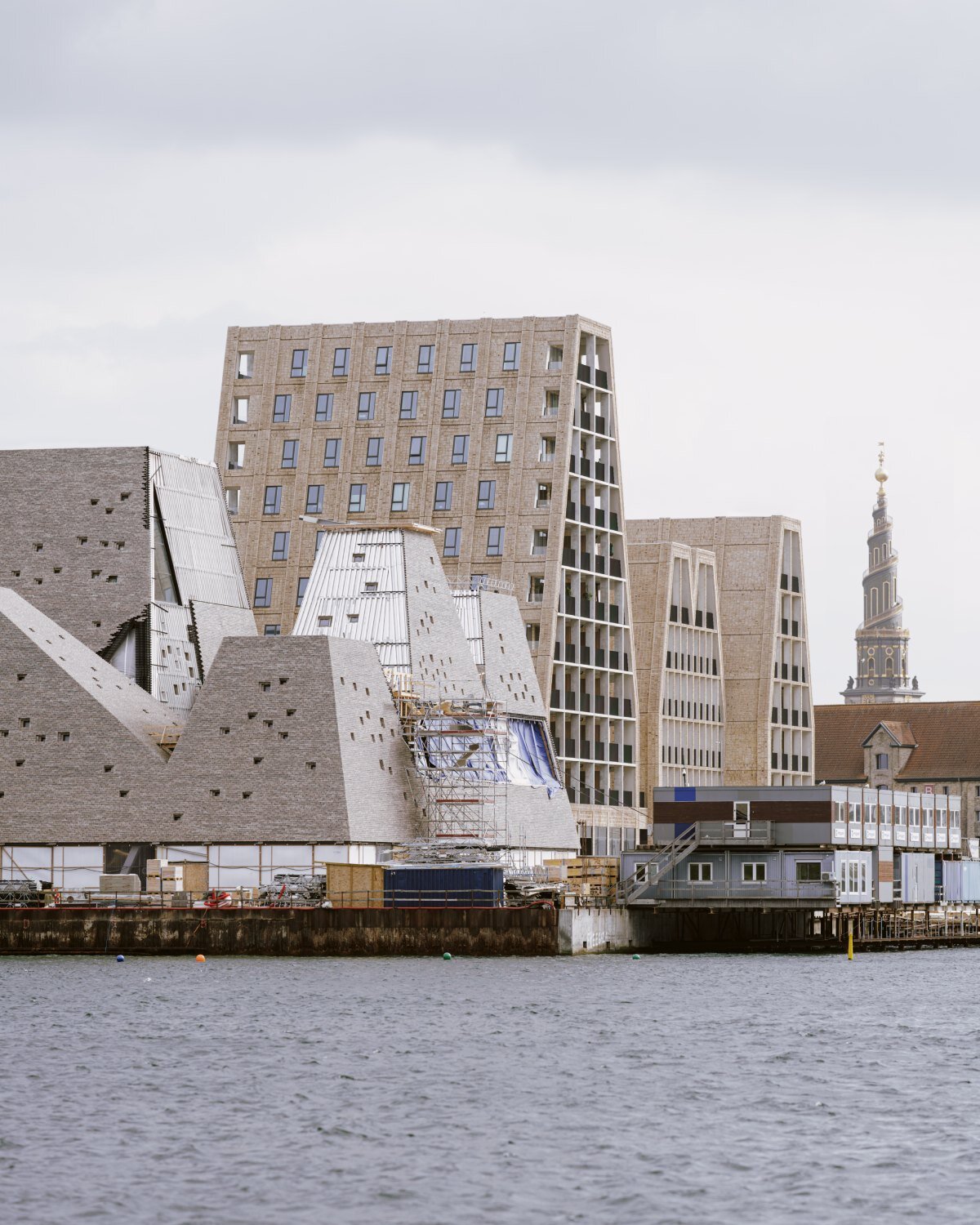 francisco tirado captures progress on kengo kuma's pyramidal culture center in copenhagen