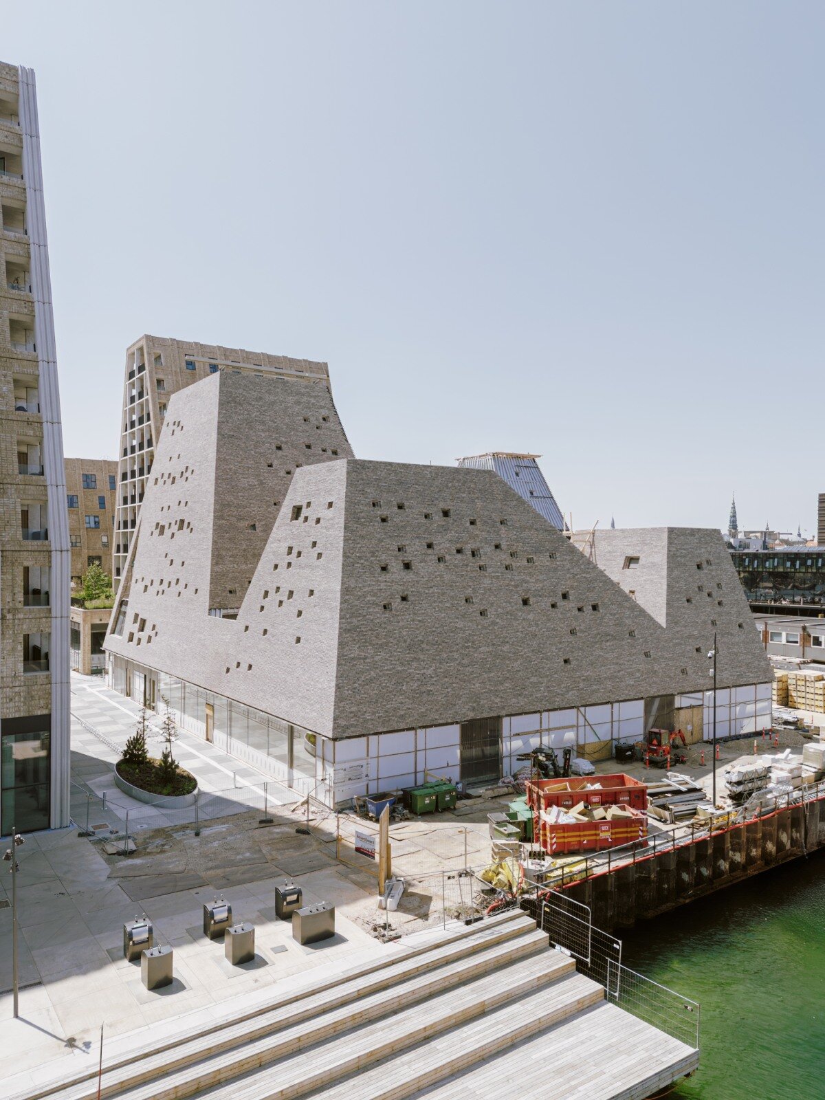 francisco tirado captures progress on kengo kuma's pyramidal culture center in copenhagen