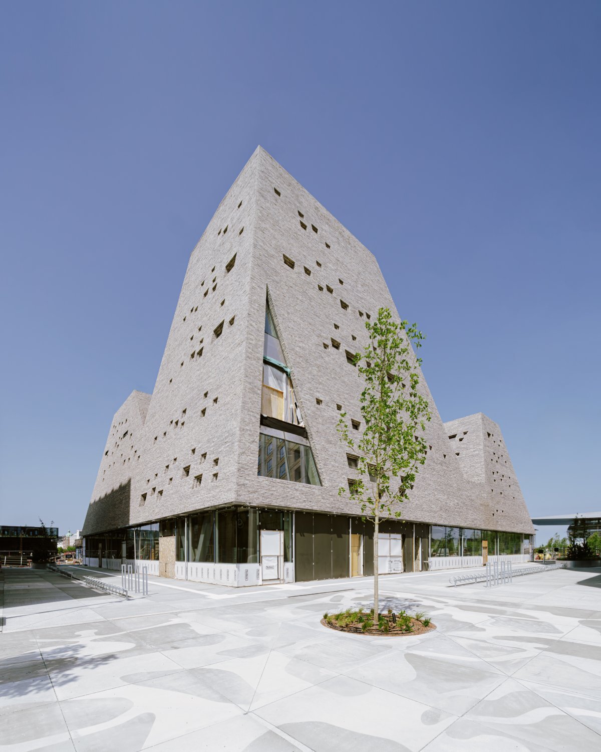 francisco tirado captures progress on kengo kuma's pyramidal culture center in copenhagen
