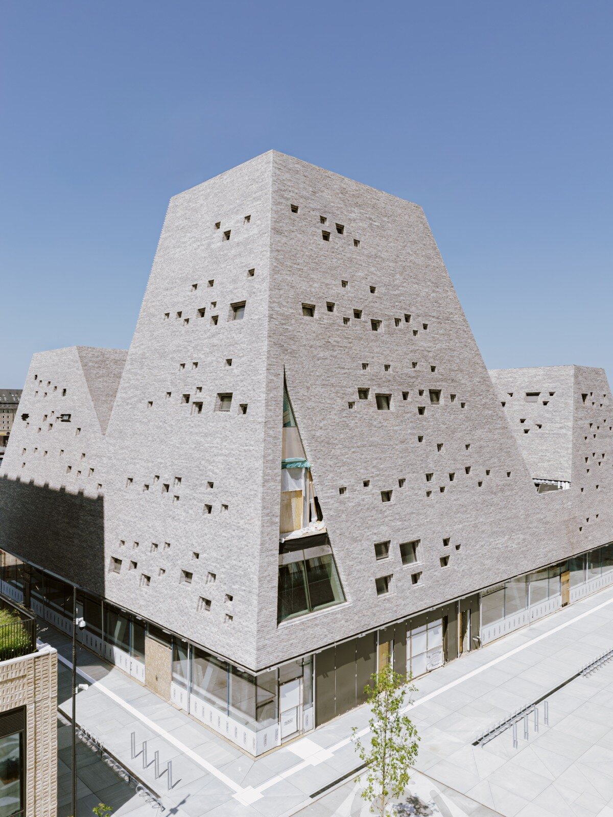 francisco tirado captures progress on kengo kuma's pyramidal culture center in copenhagen