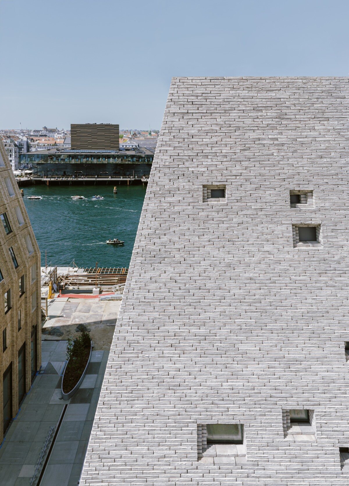 francisco tirado captures progress on kengo kuma's pyramidal culture center in copenhagen