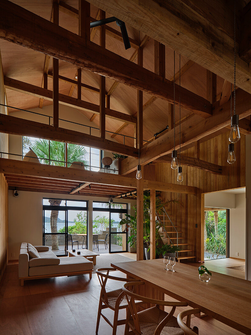 furuya design reworks japanese island bungalow into nature-immersed SANU home