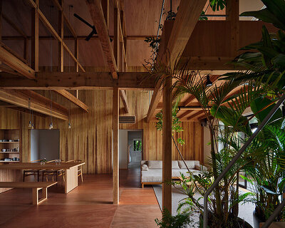 furuya design reworks japanese island bungalow into nature-immersed SANU home
