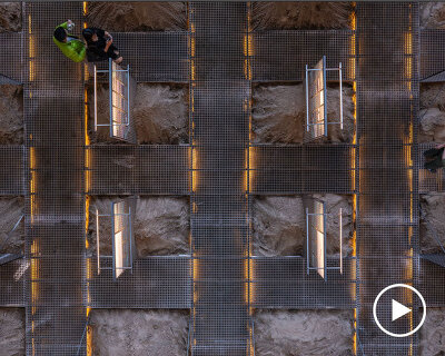 the grid by ad hoc practice repurposes former train factory in hanoi as exhibition space