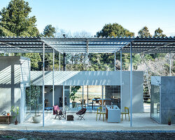 interlinked garden rooms stretch beneath single roof in tamada & wakimoto's japanese house