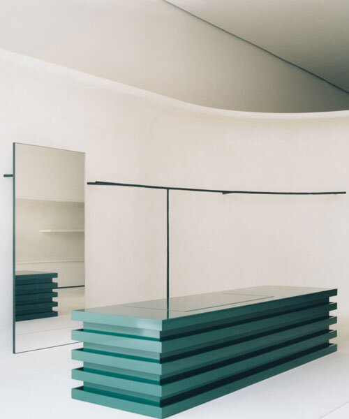 jil sander hamburg store's sculptural display elements shape hybrid boutique interiors