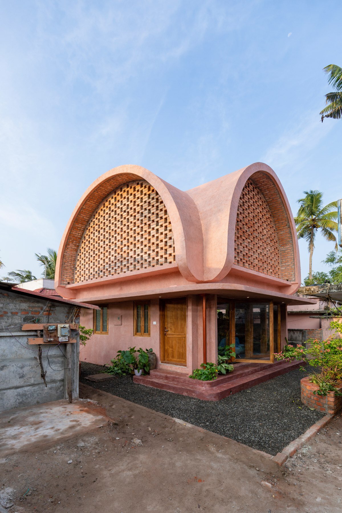 asymmetric brick vaults top NO architects' compact home in kerala, india