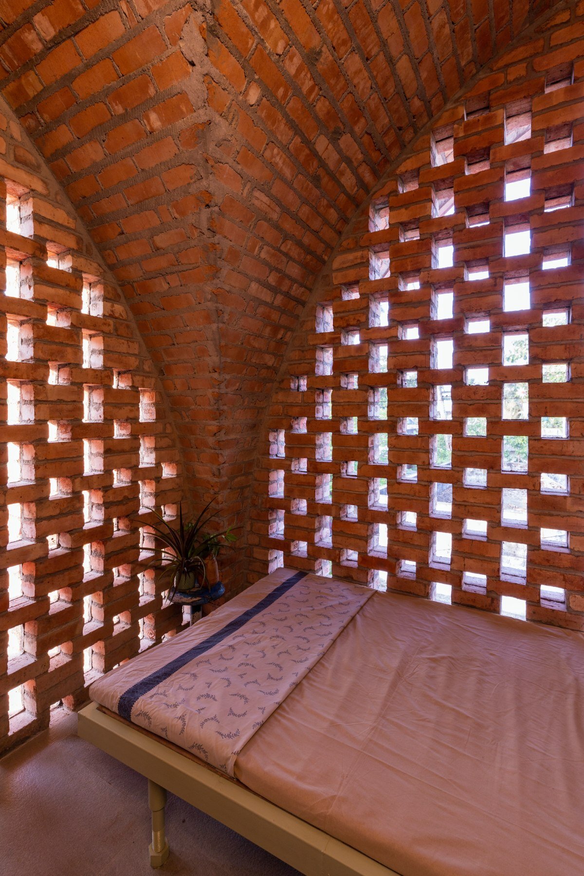 asymmetric brick vaults top NO architects' compact home in kerala, india