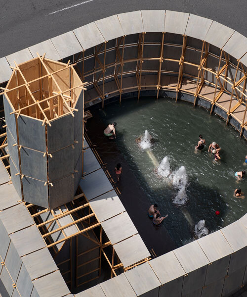 leopold banchini's temporary timber bathhouse reclaims traffic roundabout in logroño, spain