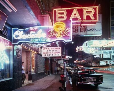 greg girard's analog photographs of 1970s–90s hong kong animate the M+ museum facade