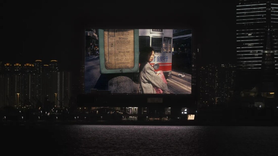 greg girard's analog photographs of 1970s–90s hong kong animate the M+ museum facade
