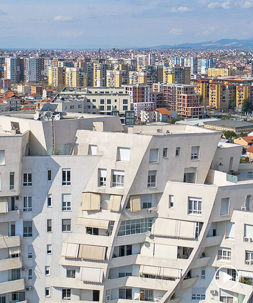 studio libeskind & kontakt weave public gardens through curved residences in tirana
