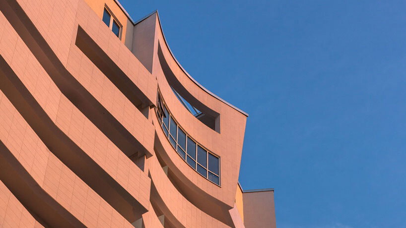 studio libeskind & kontakt weave public gardens through curved residences in tirana