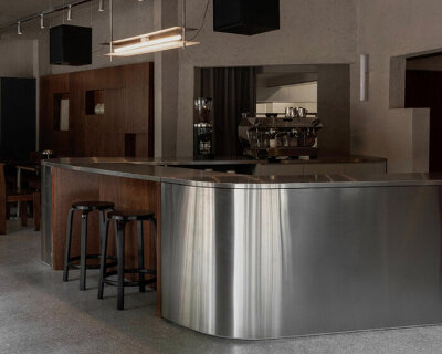 formant studio layers brutalist and industrial textures at marne café in mexico city