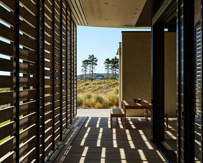 olson kundig frames new zealand coastline with modern beach house 'te whare tupu kirikiri'