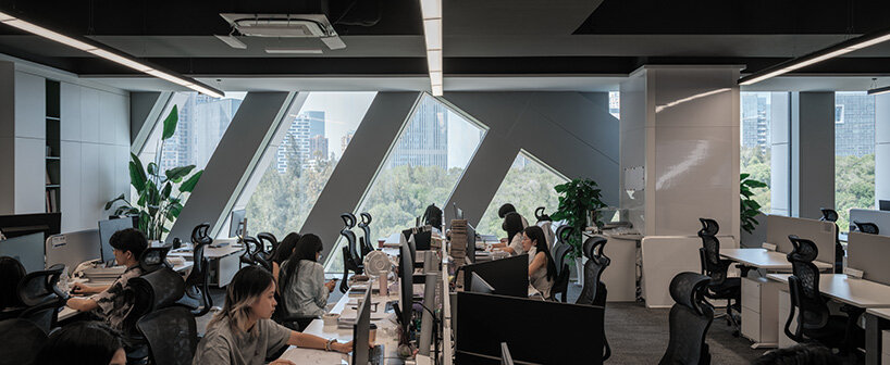 OMA completes JOMOO headquarters in china with sculptural white-striped tower