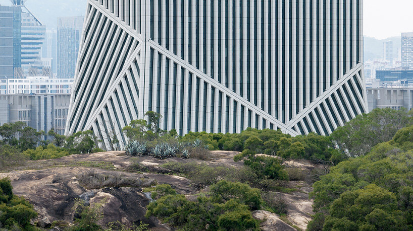 OMA completes JOMOO headquarters in china with sculptural white-striped tower