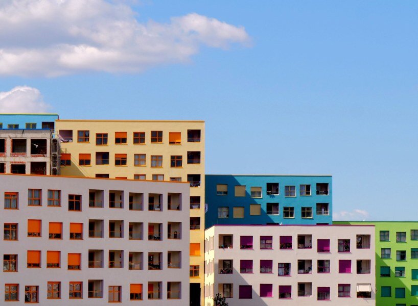 OMA's mangalem 21 masterplan steps checkerboard of homes down slope in tirana, albania