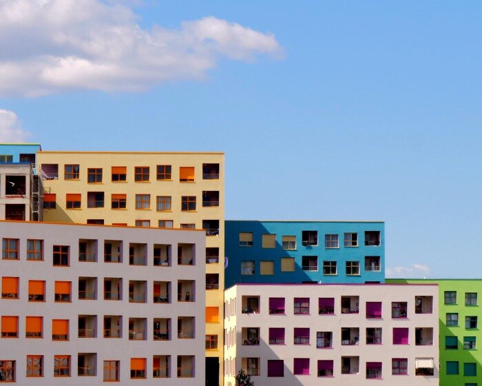 OMA's mangalem 21 masterplan steps checkerboard of homes down slope in tirana, albania