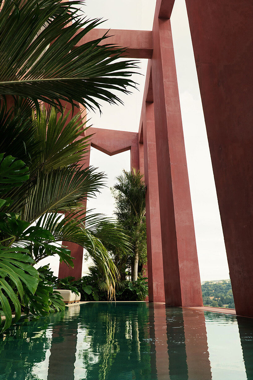 oppenheim architecture unveils all-red vlore beach tower as part of albania's coastal revival