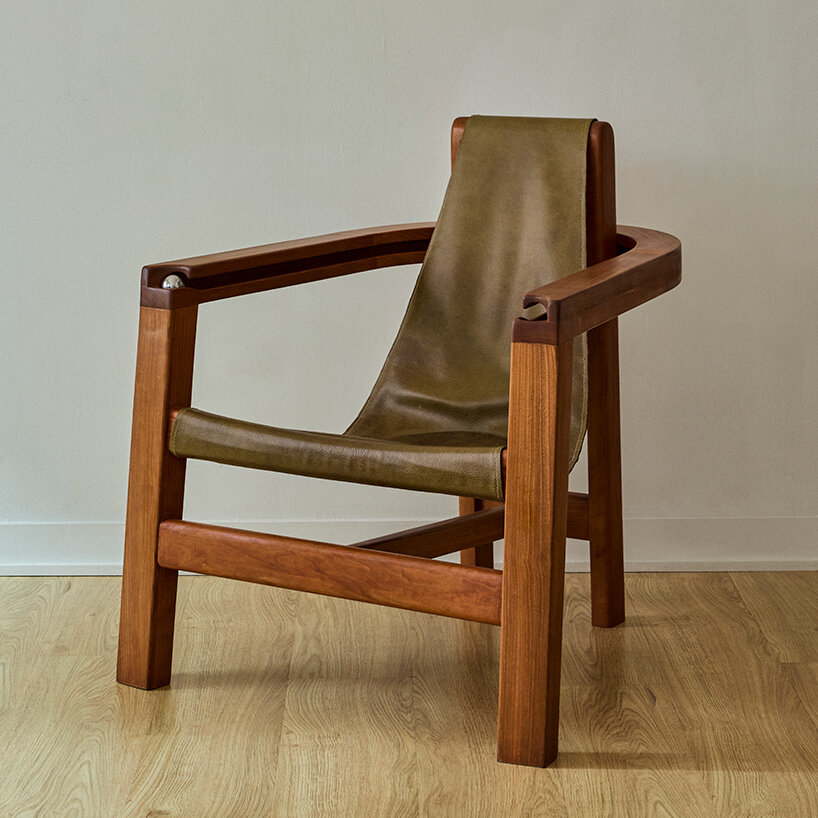 steel ball set into armrest of tanuvi hegde's 'reflect' chair for fidget-friendly design