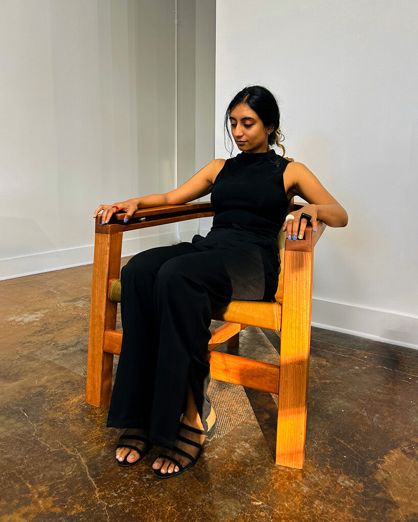 steel ball set into armrest of tanuvi hegde's 'reflect' chair for fidget-friendly design