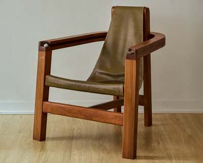 steel ball set into armrest of tanuvi hegde's 'reflect' chair for fidget-friendly design