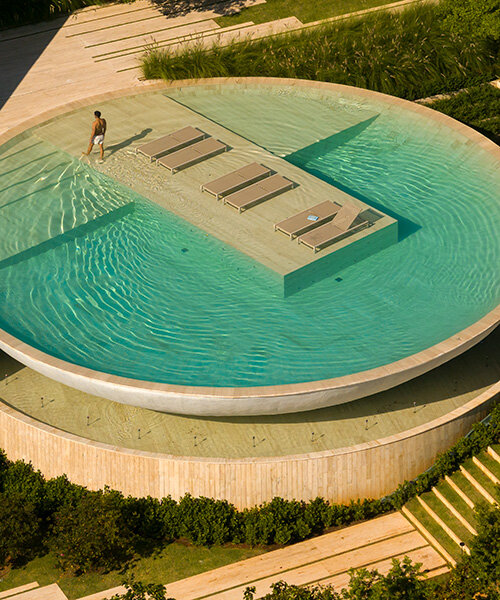 passarelli arquitetos perches swimming pool like a monumental bowl beside casa da baro