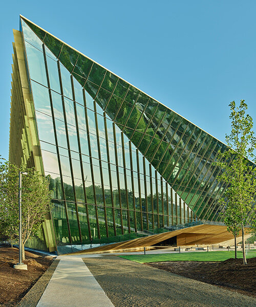 folded glass facade fronts AWSOM medical school's new arkansas building