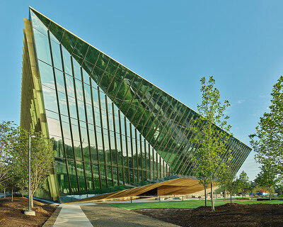 folded glass facade fronts AWSOM medical school's new arkansas building