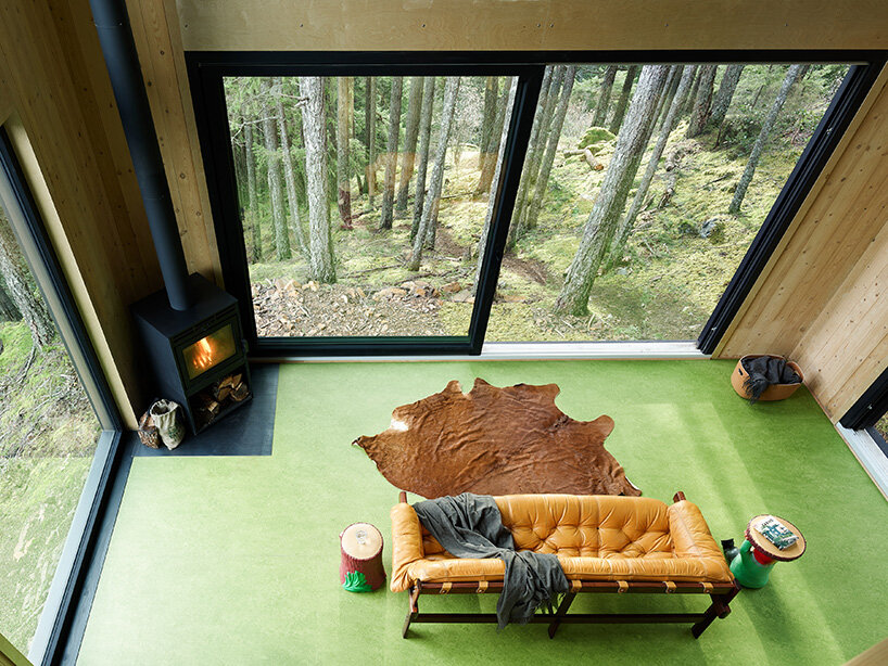 prefabricated mass timber retreat by daria sheina studio lands on remote canadian island