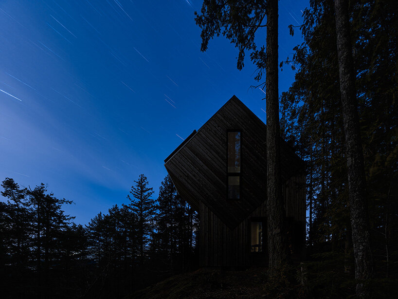 prefabricated mass timber retreat by daria sheina studio lands on remote canadian island