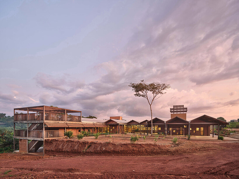 rammed earth and local wood shape community-first kindergarten in cameroon by urbanitree