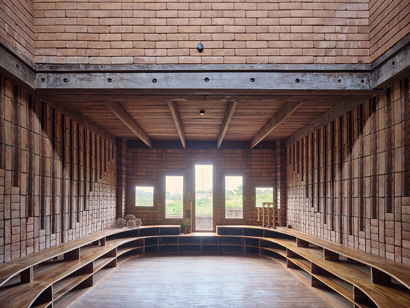 rammed earth and local wood shape community-first kindergarten in cameroon by urbanitree