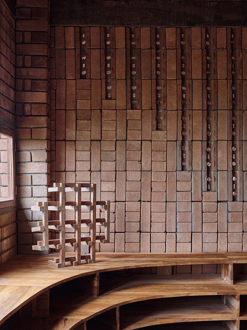 rammed earth and local wood shape community-first kindergarten in cameroon by urbanitree