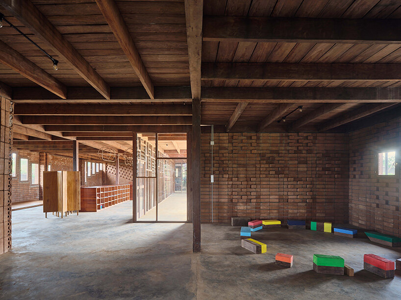 rammed earth and local wood shape community-first kindergarten in cameroon by urbanitree