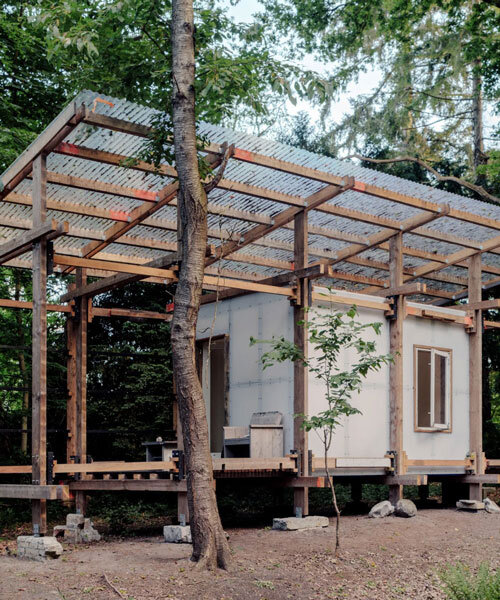 salvaged materials compose studio-method's new hub for art and ecology in dutch forest