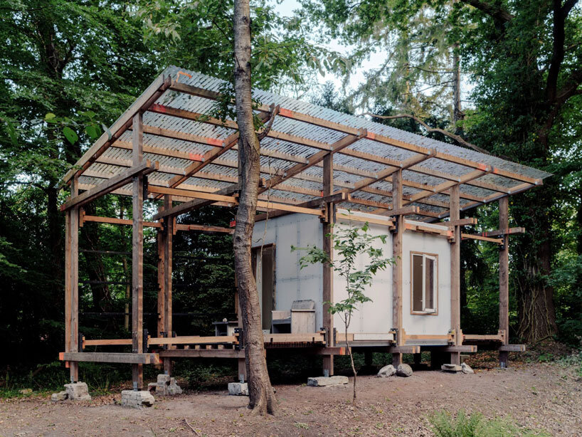 salvaged materials compose studio-method's new hub for art and ecology in dutch forest