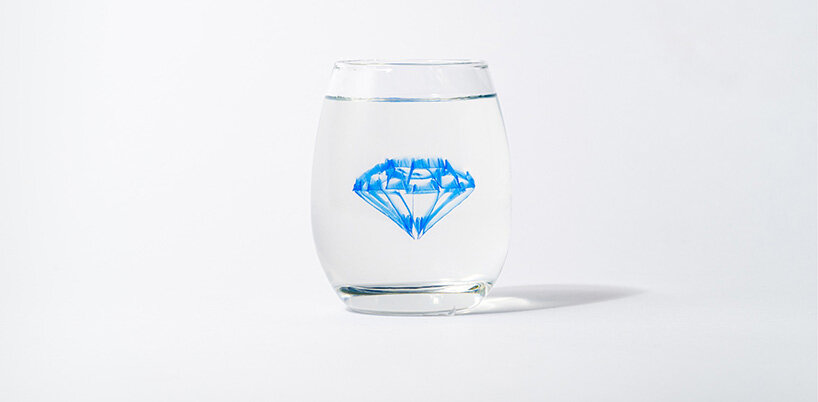 drawing robot allows users to sketch floating illustrations inside liquids