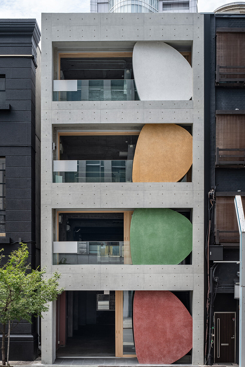 sculptural ovals shape seismic retrofit of 50-year-old building in japan by C+A