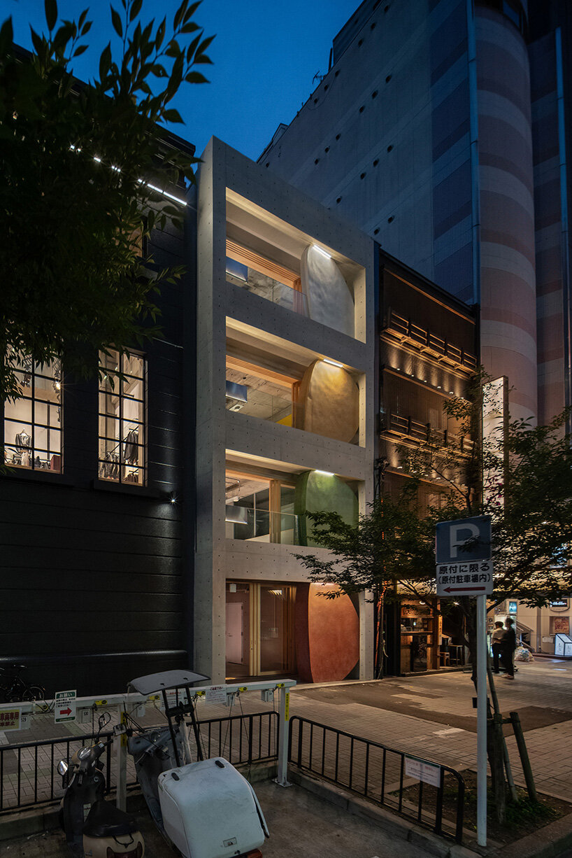 sculptural ovals shape seismic retrofit of 50-year-old building in japan by C+A