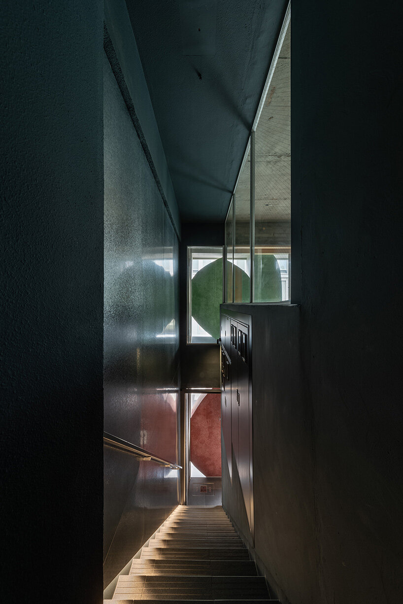 sculptural ovals shape seismic retrofit of 50-year-old building in japan by C+A