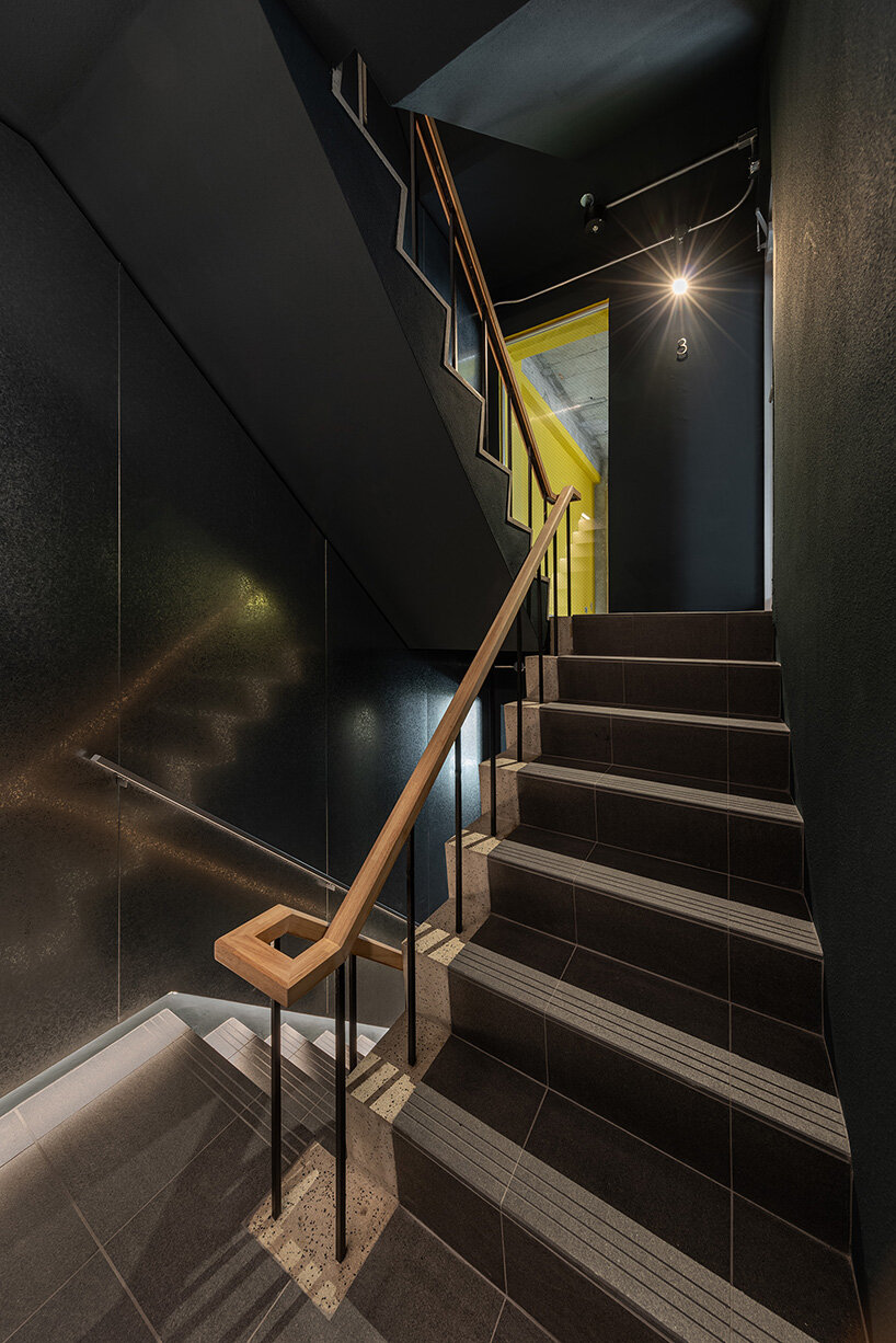 sculptural ovals shape seismic retrofit of 50-year-old building in japan by C+A