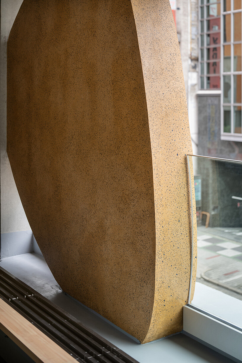 sculptural ovals shape seismic retrofit of 50-year-old building in japan by C+A